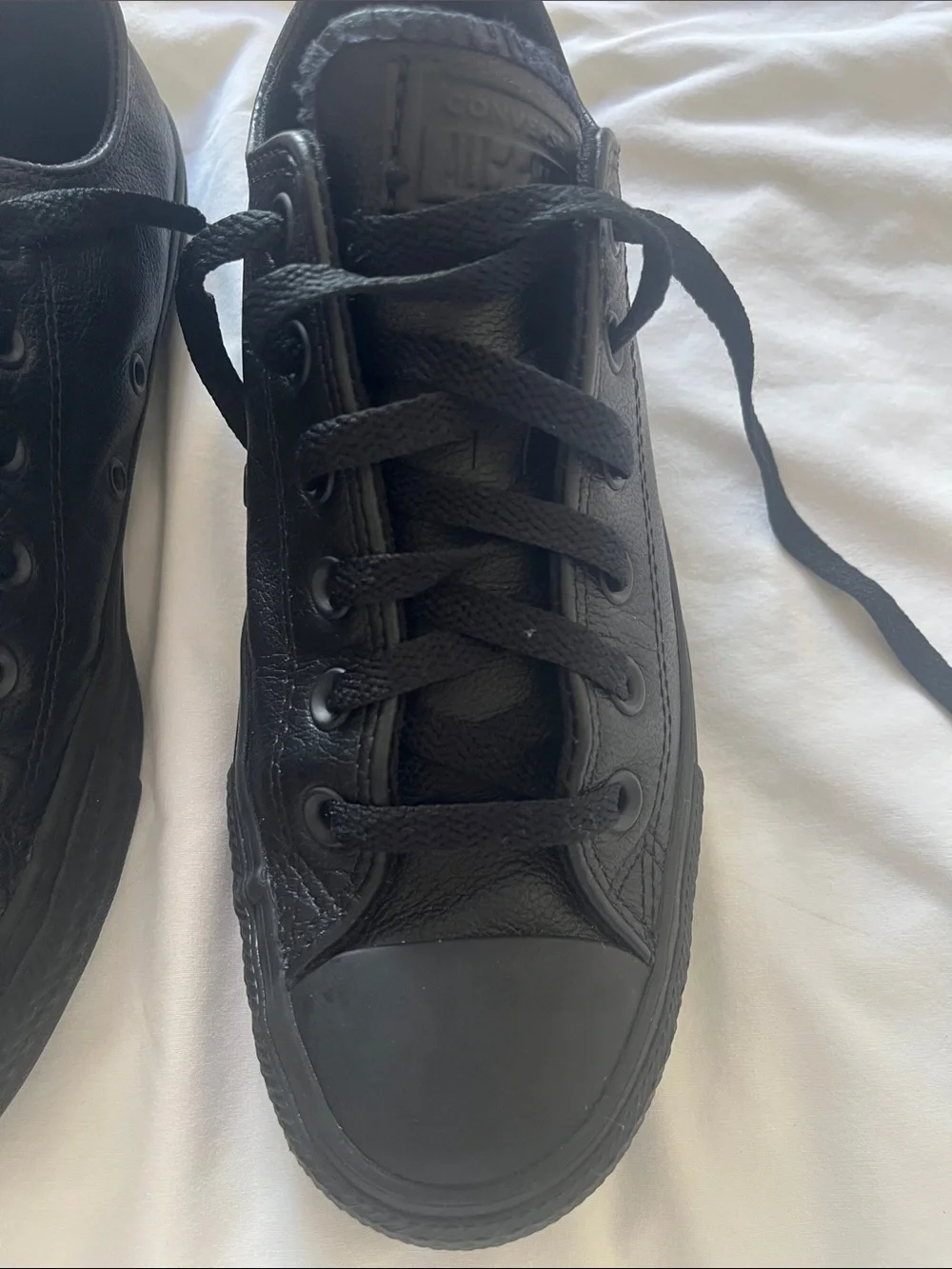 Converse Men's Low-Top Leather Chuck Taylor Sneakers in Black